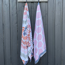 Load image into Gallery viewer, The Gum sand-free beach towels hanging together.