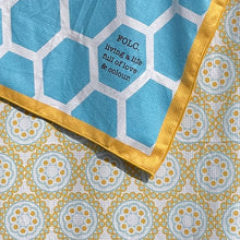 Load image into Gallery viewer, Close-up of The Wattle sand-free beach towels from the FOLC Family Pack.