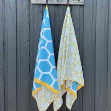Load image into Gallery viewer, The Wattle sand-free beach towels hanging to dry.