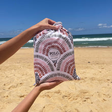 Load image into Gallery viewer, The Gum XXL sand-free beach towel packed inside its compact travel pouch.
